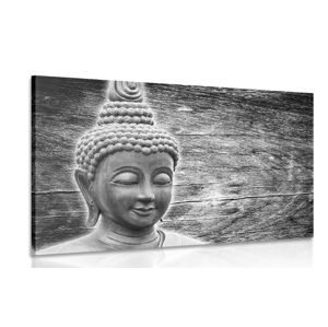 Obraz socha Budhu na drevenom pozadí v čiernobielom prevedení
