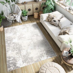 domtextilu.sk Krémový dizajnový koberec so sivým abstraktným vzorom 68359-243352